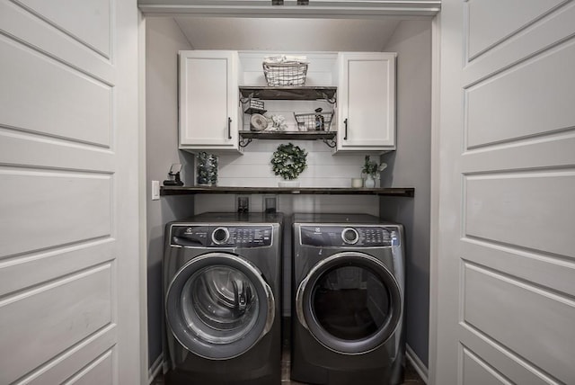 2251 Valley View Dr, Tonganoxie, KS 66086 - washroom with washer and clothes dryer and cabinet space