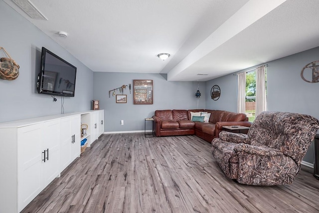 2251 Valley View Dr, Tonganoxie, KS 66086 - living area featuring wood finished floors and baseboards