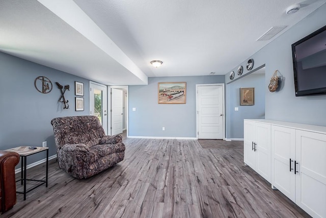 2251 Valley View Dr, Tonganoxie, KS 66086 - sitting room with baseboards and wood finished floors