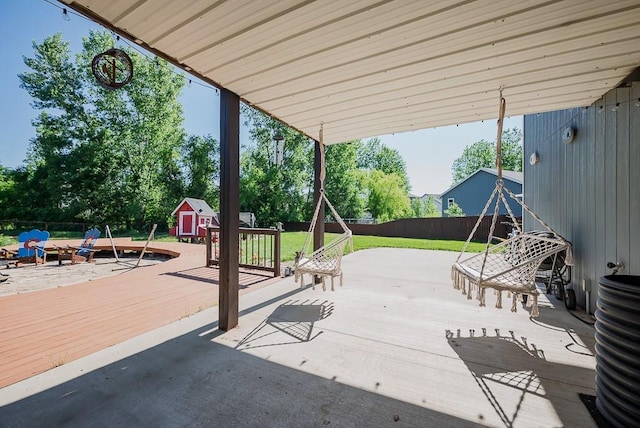 2251 Valley View Dr, Tonganoxie, KS 66086 - fenced backyard with a wooden deck