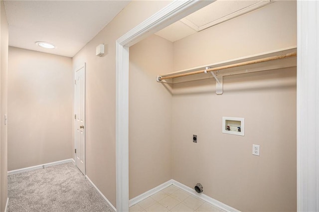 laundry area featuring electric dryer hookup, washer hookup, and baseboards
