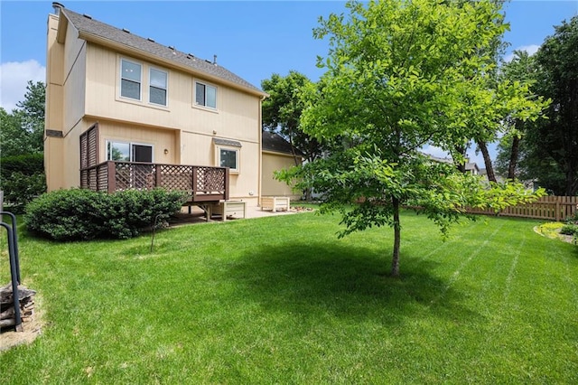 rear view of house with a deck