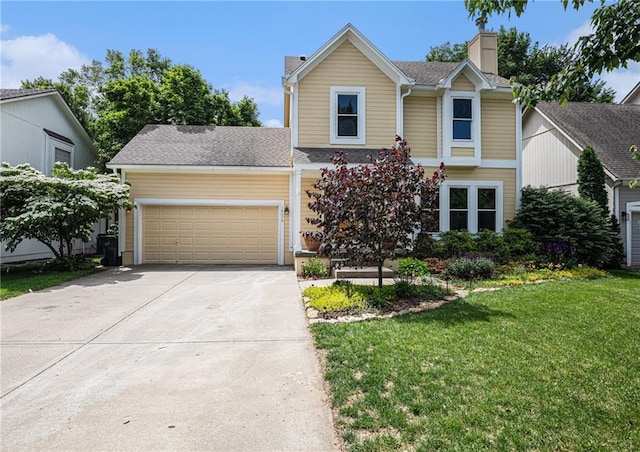 traditional-style home with a chimney, driveway, a garage, a front yard, and a shingled roof