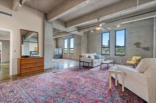 360 W Pershing Rd Unit 210, Kansas City, MO 64108 - living area with rail lighting and ceiling fan