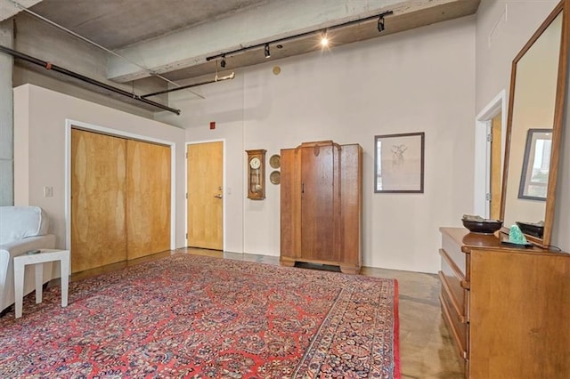 360 W Pershing Rd Unit 210, Kansas City, MO 64108 - bedroom with track lighting and a towering ceiling