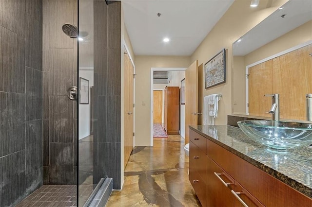 360 W Pershing Rd Unit 210, Kansas City, MO 64108 - full bath featuring vanity, a stall shower, marble tiled floors, toilet, and recessed lighting