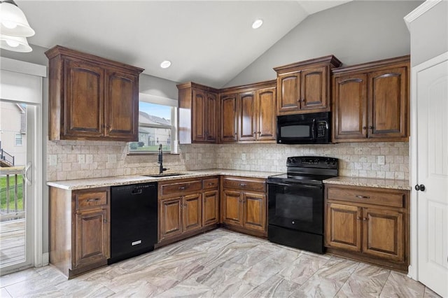 kitchen featuring black appliances, a sink, lofted ceiling, decorative backsplash, and recessed lighting