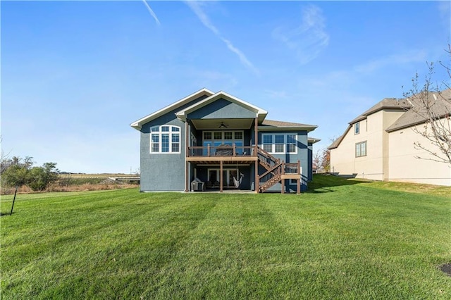16609 Cody St, Overland Park, KS 66221 - back of property featuring ceiling fan, stairs, a lawn, and a wooden deck