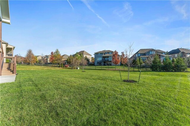 16609 Cody St, Overland Park, KS 66221 - view of yard featuring a residential view and stairway
