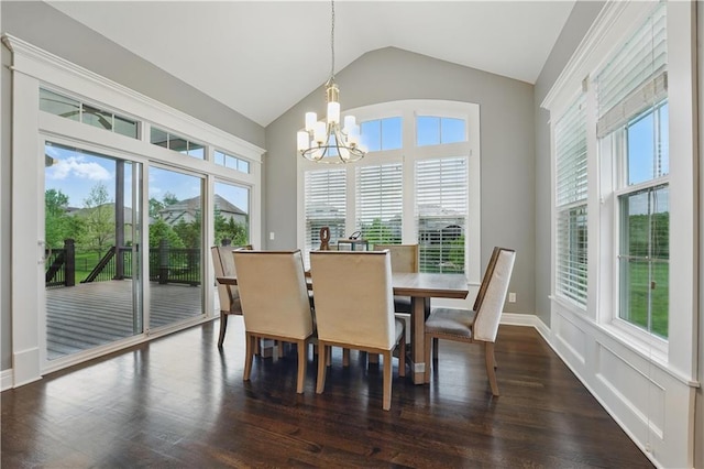 16609 Cody St, Overland Park, KS 66221 - dining space with plenty of natural light, a chandelier, vaulted ceiling, and dark wood-style floors