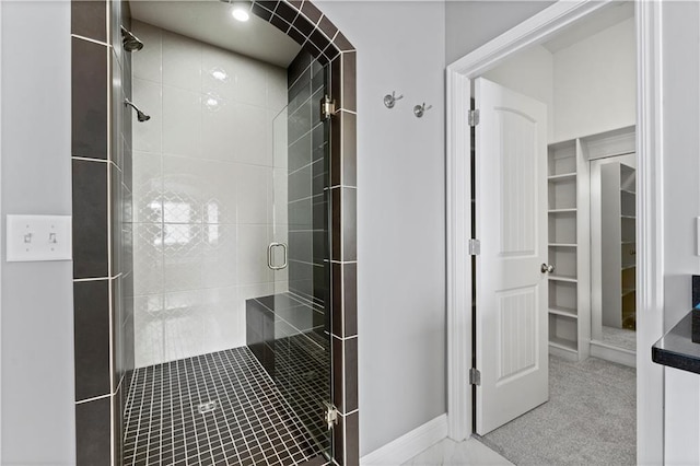 16609 Cody St, Overland Park, KS 66221 - bathroom with a shower stall and a walk in closet