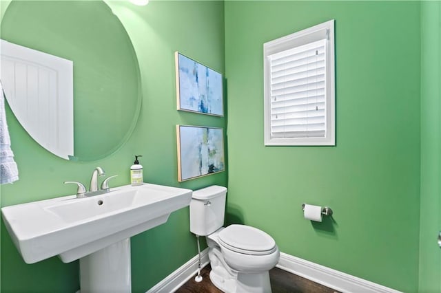 16609 Cody St, Overland Park, KS 66221 - half bath with baseboards and wood finished floors