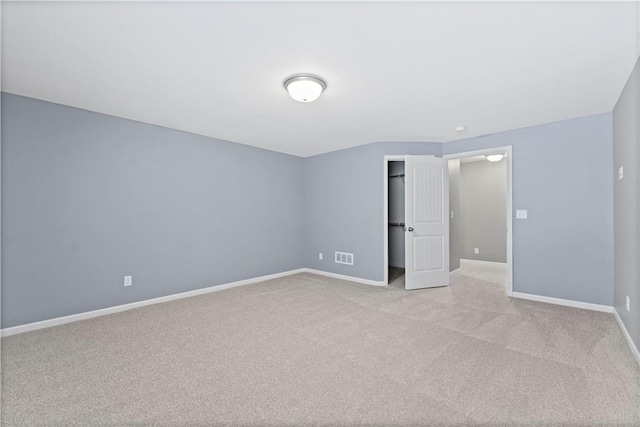 16609 Cody St, Overland Park, KS 66221 - unfurnished bedroom featuring carpet flooring and a closet