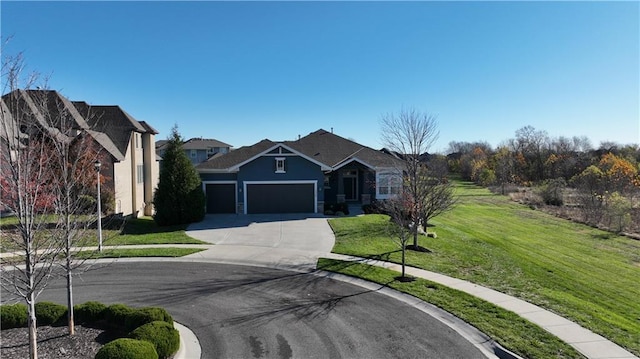 16609 Cody St, Overland Park, KS 66221 - single story home with an attached garage, concrete driveway, a front yard, and stucco siding