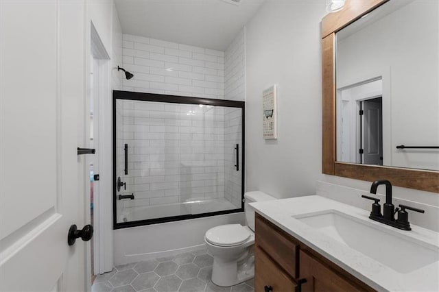 16521 S Stagecoach St, Olathe, KS 66062 - full bath with toilet, vanity, enclosed tub / shower combo, and tile patterned floors