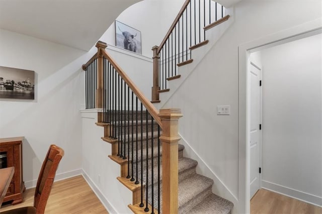 16521 S Stagecoach St, Olathe, KS 66062 - stairs featuring wood finished floors and baseboards