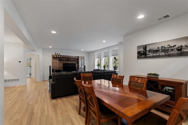 16521 S Stagecoach St, Olathe, KS 66062 - dining space with light wood-type flooring and recessed lighting