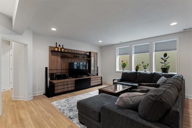 16521 S Stagecoach St, Olathe, KS 66062 - living area featuring light wood-style floors, baseboards, and recessed lighting