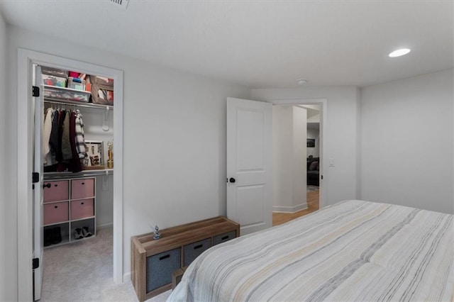16521 S Stagecoach St, Olathe, KS 66062 - bedroom with a closet, recessed lighting, a walk in closet, and light colored carpet