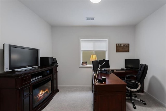 16521 S Stagecoach St, Olathe, KS 66062 - office area with carpet, baseboards, and a glass covered fireplace