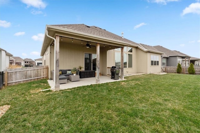 16521 S Stagecoach St, Olathe, KS 66062 - back of property with a ceiling fan, an outdoor hangout area, and a patio