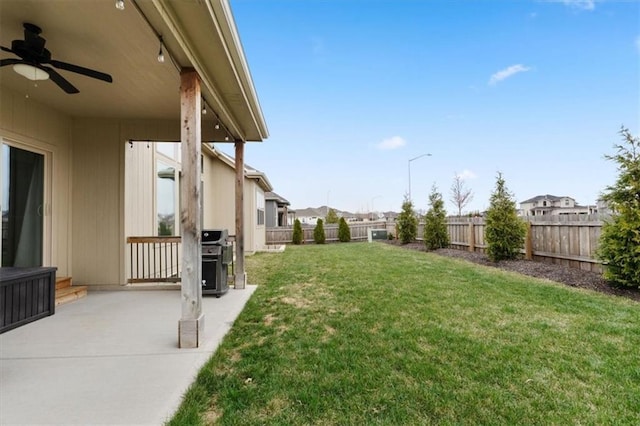 16521 S Stagecoach St, Olathe, KS 66062 - view of yard with a ceiling fan and a patio area