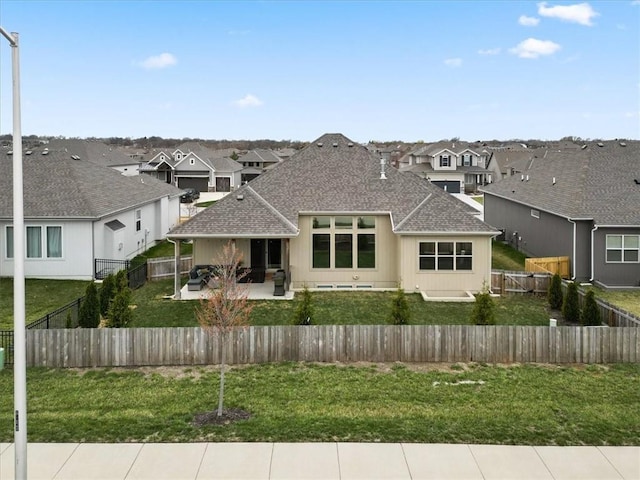16521 S Stagecoach St, Olathe, KS 66062 - back of property with a residential view, a patio, and a shingled roof