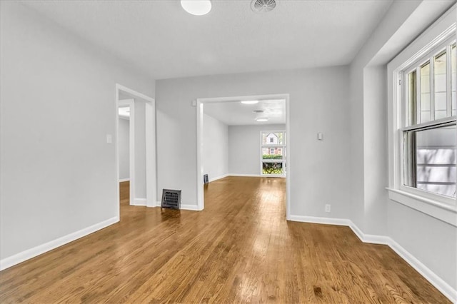 2647 Minnesota Ave, Kansas City, KS 66102 - spare room featuring wood finished floors and baseboards