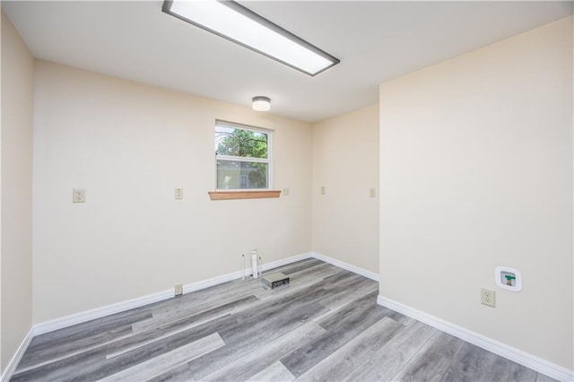 901 N 9th St, Neodesha, KS 66757 - spare room with wood finished floors and baseboards