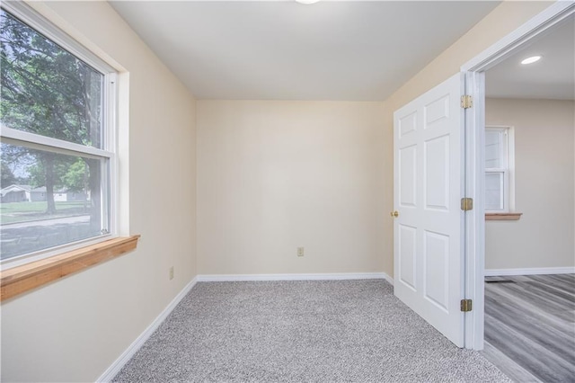901 N 9th St, Neodesha, KS 66757 - carpeted spare room featuring baseboards and recessed lighting