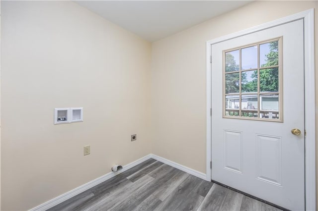 901 N 9th St, Neodesha, KS 66757 - laundry room featuring electric dryer hookup, dark wood-style floors, baseboards, and hookup for a washing machine