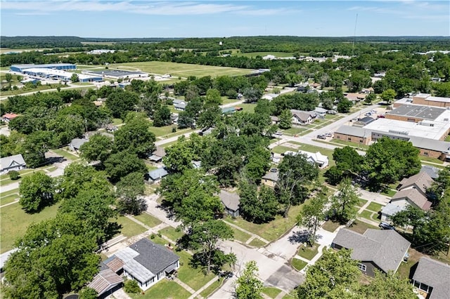 901 N 9th St, Neodesha, KS 66757 - aerial view of residential area with a tree filled landscape