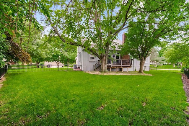 12808 Howe Dr, Leawood, KS 66209 - view of yard featuring a wooden deck