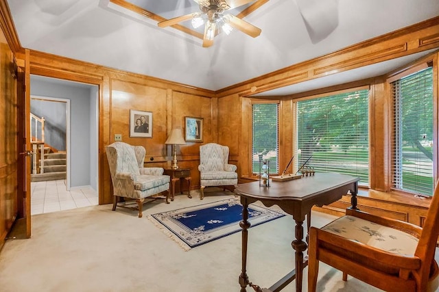 12808 Howe Dr, Leawood, KS 66209 - home office with ceiling fan, light colored carpet, wood walls, and vaulted ceiling