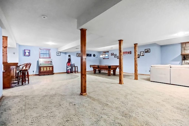 12808 Howe Dr, Leawood, KS 66209 - below grade area featuring billiards table, a bar, and baseboards