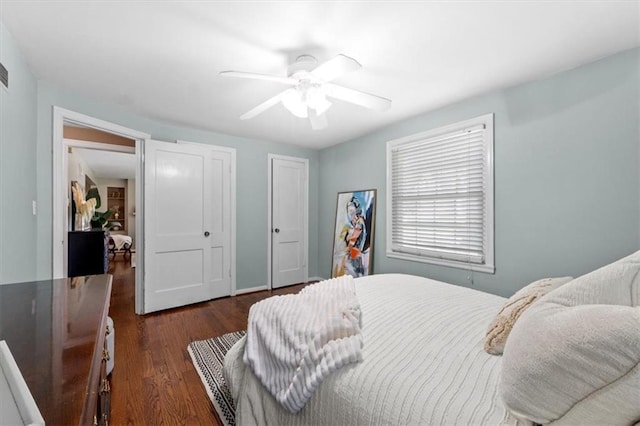 4111 W 69th St, Prairie Village, KS 66208 - bedroom with dark wood-style flooring and ceiling fan