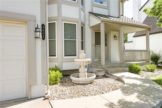6402 W 147th Ter, Overland Park, KS 66223 - entrance to property featuring stucco siding and covered porch