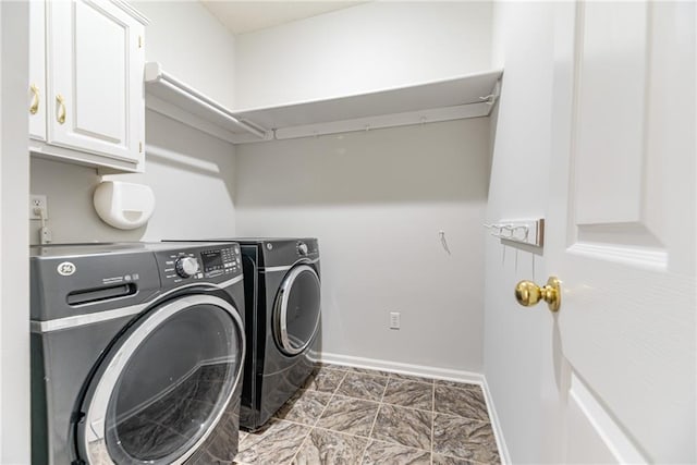6402 W 147th Ter, Overland Park, KS 66223 - laundry room with washer and clothes dryer, cabinet space, and baseboards