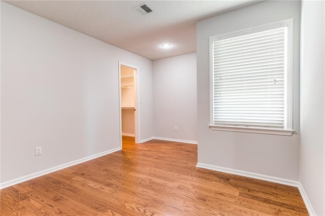 6402 W 147th Ter, Overland Park, KS 66223 - empty room featuring light wood-type flooring, baseboards, and recessed lighting