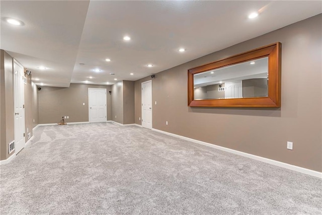 6402 W 147th Ter, Overland Park, KS 66223 - finished below grade area with light carpet, baseboards, and recessed lighting
