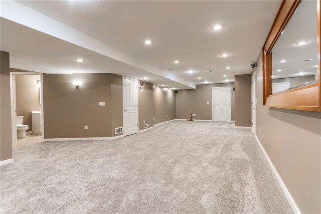 6402 W 147th Ter, Overland Park, KS 66223 - finished basement featuring light carpet, baseboards, and recessed lighting