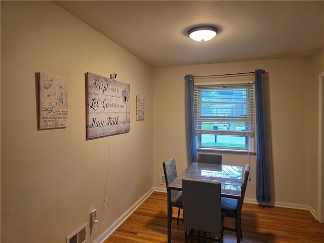 529 S Northern Blvd, Sugar Creek, MO 64054 - dining room featuring wood finished floors and baseboards