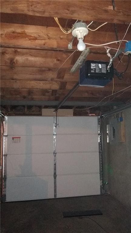 2219 E 75th St, Kansas City, MO 64132 - garage with a garage door opener and electric panel