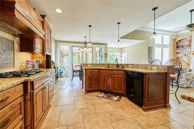 kitchen featuring black dishwasher, a breakfast bar, a sink, gas stovetop, and custom range hood