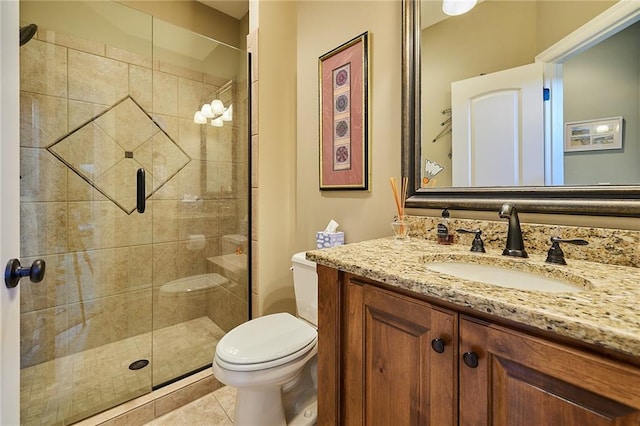bathroom with toilet, a stall shower, vanity, and tile patterned floors