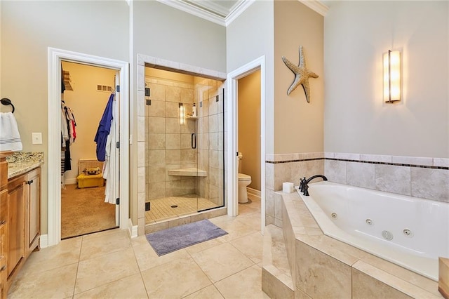 bathroom featuring a whirlpool tub, a shower stall, crown molding, toilet, and tile patterned flooring