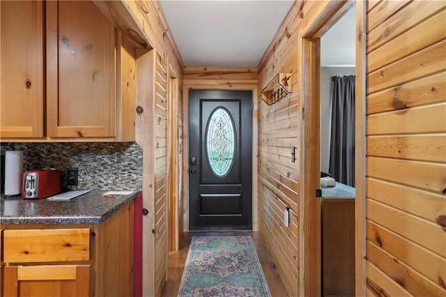 429 SE Lakeside Dr, Lacygne, KS 66040 - doorway with wood finished floors and wooden walls