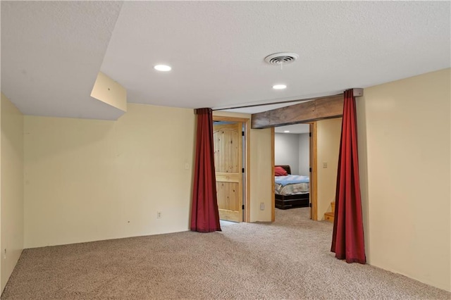 429 SE Lakeside Dr, Lacygne, KS 66040 - finished basement featuring carpet, recessed lighting, and a textured ceiling