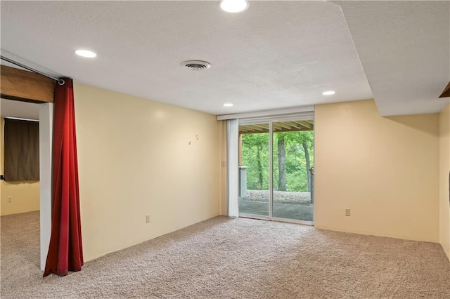 429 SE Lakeside Dr, Lacygne, KS 66040 - unfurnished room featuring carpet, recessed lighting, and a textured ceiling