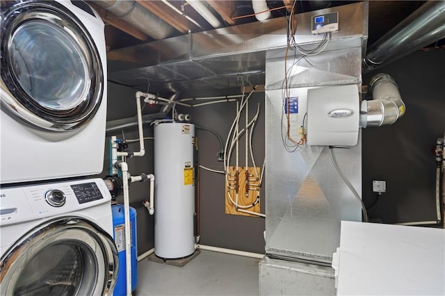 429 SE Lakeside Dr, Lacygne, KS 66040 - utility room featuring stacked washing machine and dryer and water heater